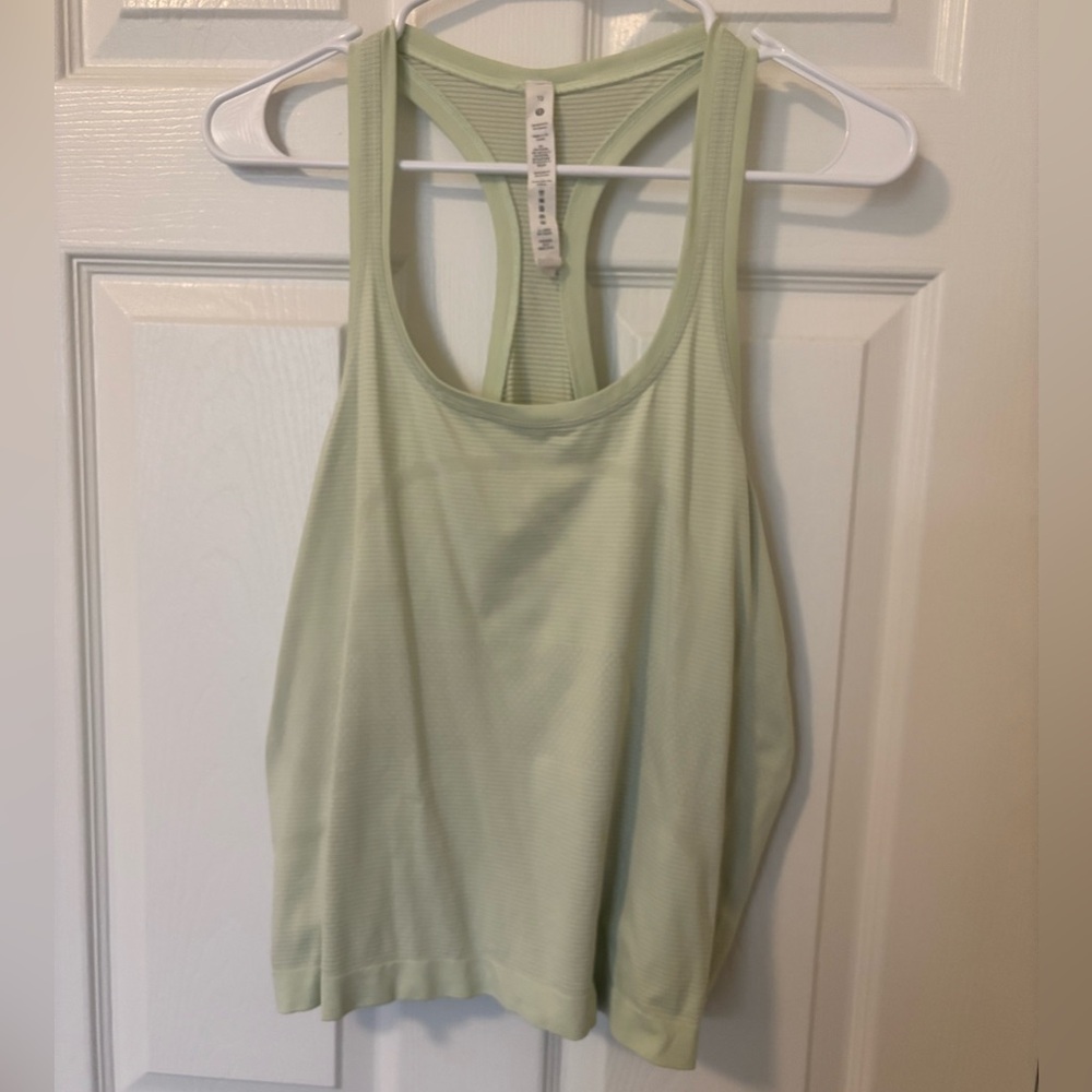 Women’s Lululemon size 12 light green racer back active tank top